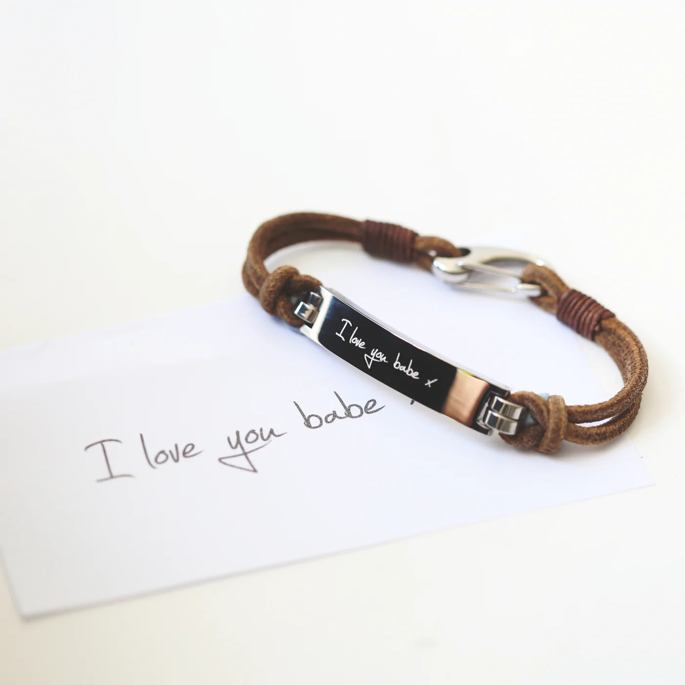 Leather bracelet with heavy silver clasp and silver bar engraved with the message of your choice in your own handwriting