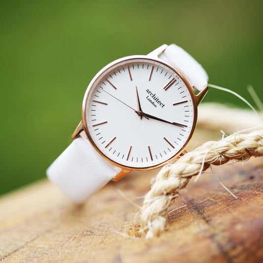 ladies engraved watch white strap and face