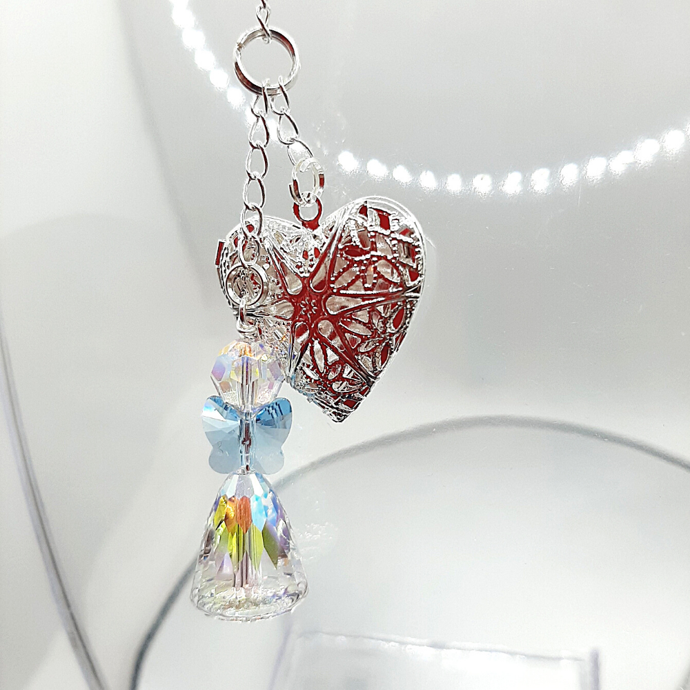 Opening lockets with crystal angel in a bouquet charm