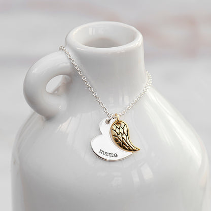 Gold plated angel wing charm is hung next to a partially formed silver plated heart. Together they complete the heart shape. Silver part of heart can be engraved with a name of your choice.