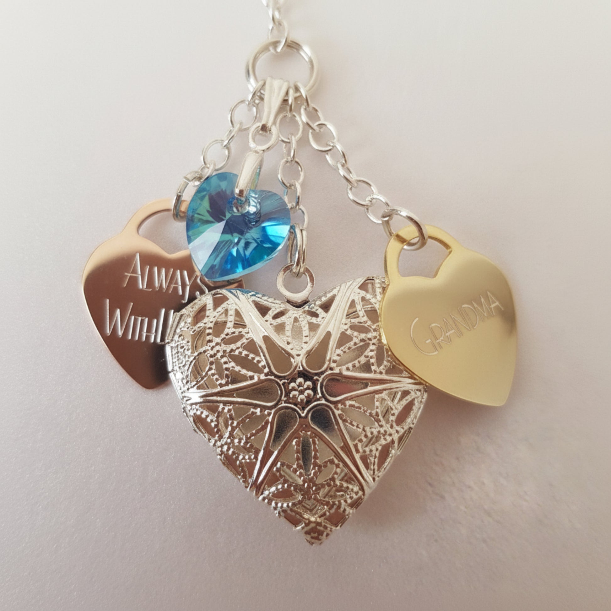 Because our wedding bouquet charm is handmade, we can customise to your choice. This charm has two engraved hearts. One saying Always With You and the other is engraved with Grandma
