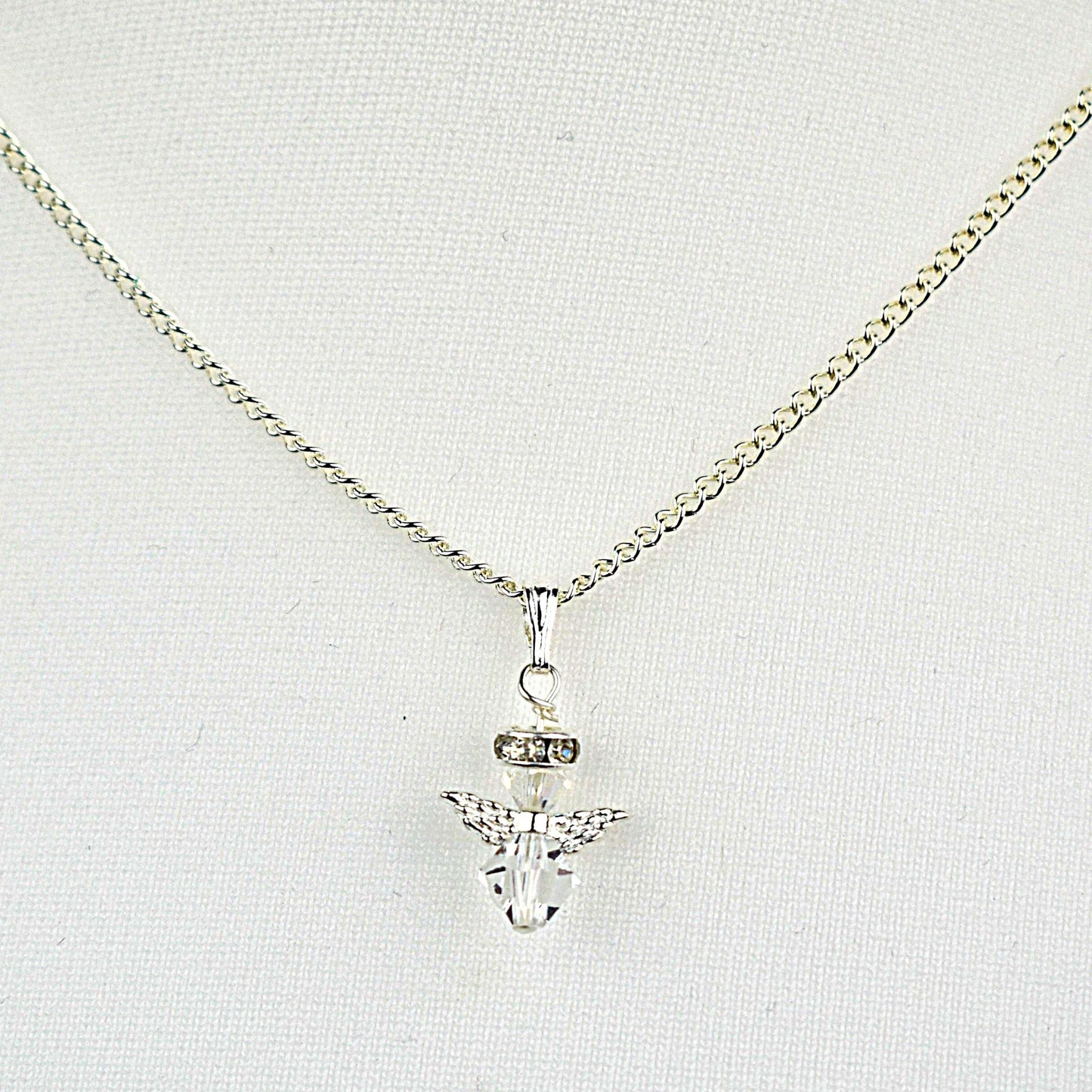 Snow angel pendant in clear crystal on a 16" silver plated chain