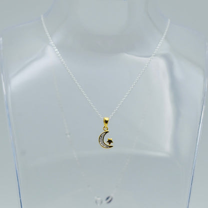 gold vermeil crescent moon with cubic zircona and a tiny star hung from a sterling silver chain, shown on a display bust, Little Lockets London Message in a Bottle range