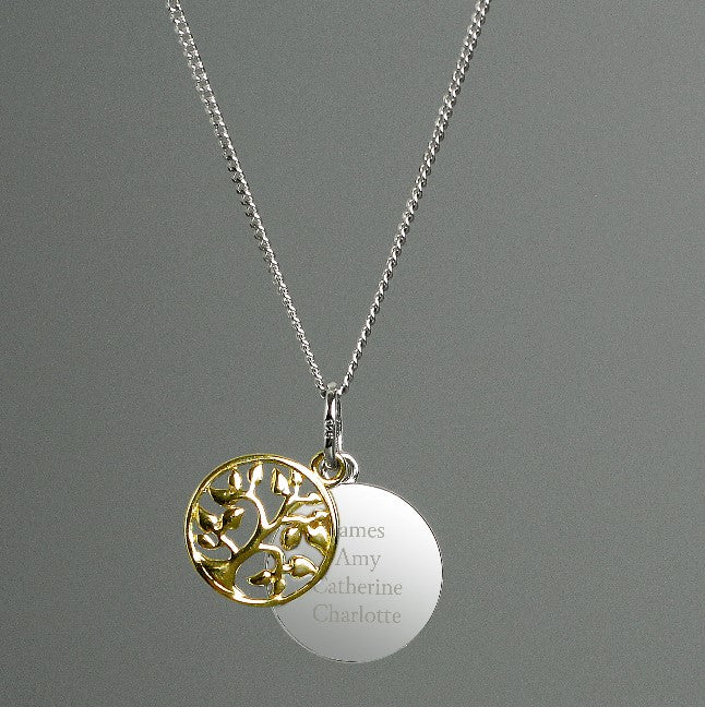 Sterling silver disc engraved with your own message, alongside a gold plated tree of life charm, family tree pendant
