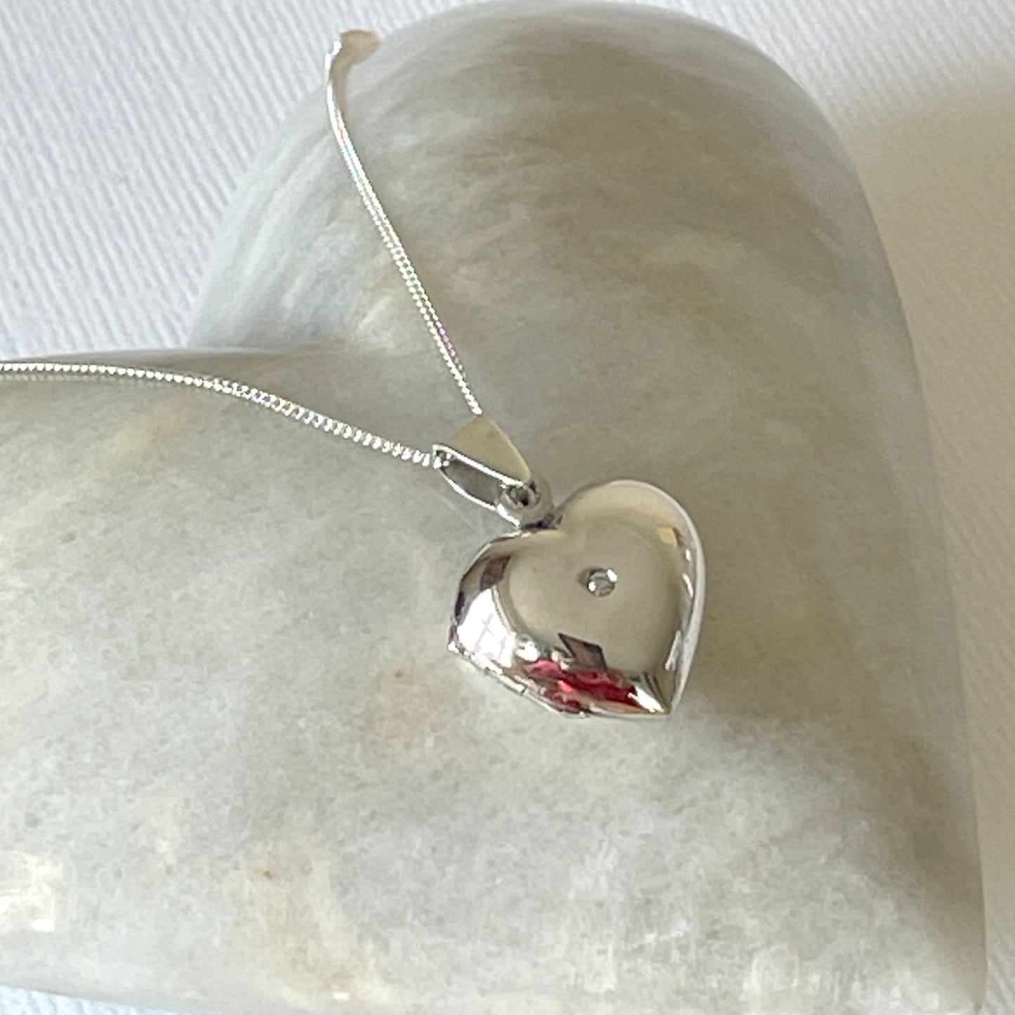 Sterling silver heart locket with cubic zircona stone