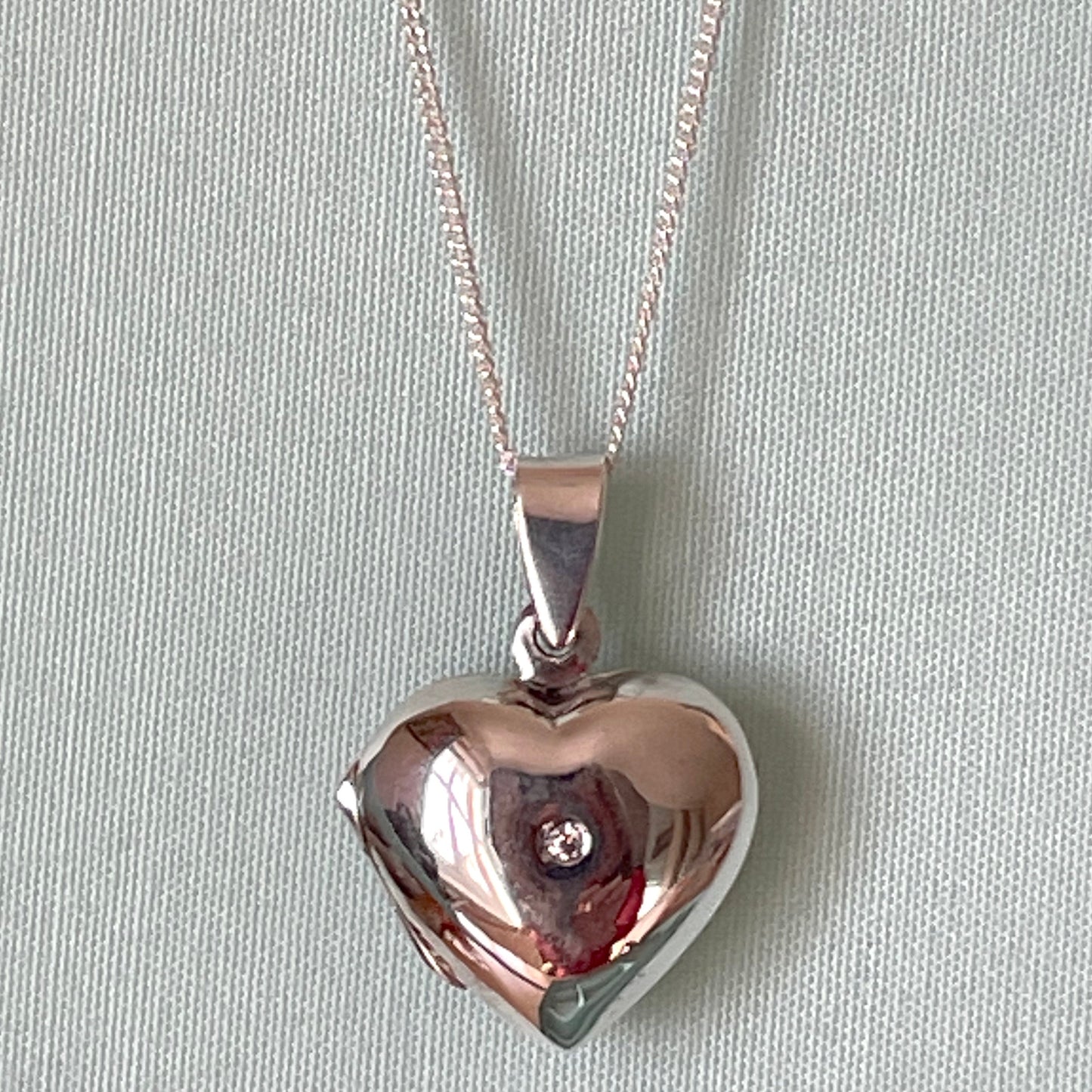 Sterling silver heart locket with cubic zircona stone