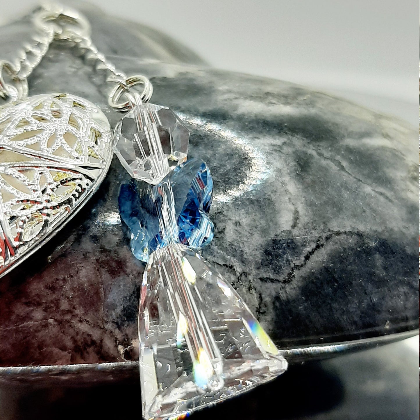 A crystal angel with blue wings 