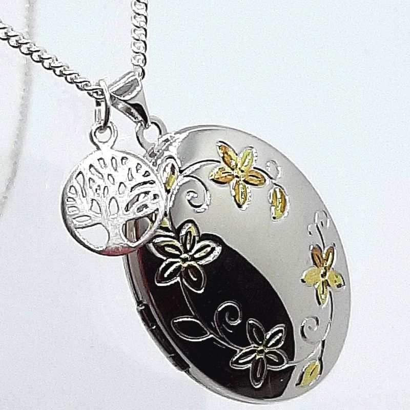 Large sterling silver locket with gold inlay, shown with optional Family Tree charm