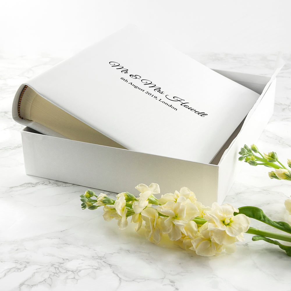 Wedding photo album handmade from luxuriously soft Dream Vachetta Italian leather.  High quality interior with interleaved glassine pages .Presented in a white gift box.