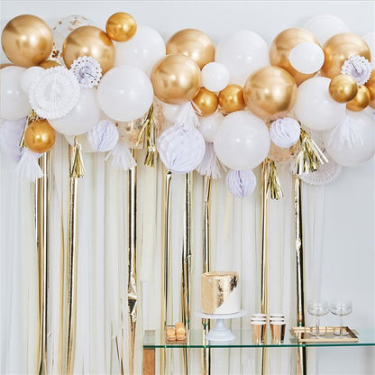 gold and white mix balloon decorating kit with tassels and pom poms