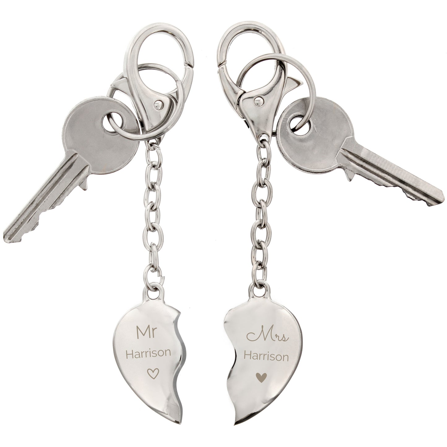 Two key rings when joined together form a heart. Each keyring is personalised with Mr or Mrs and the surname of your choice.