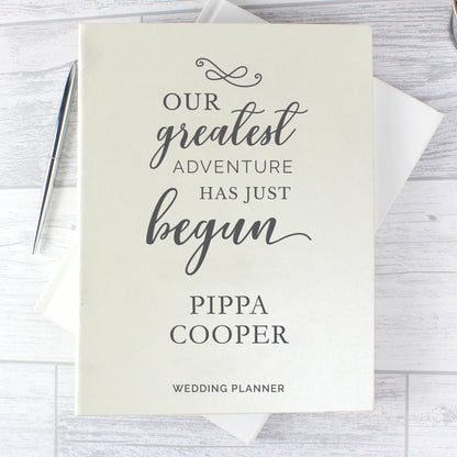 personalised wedding planner with the message "our greatest adventure has just begun", ring bound, and personalised with the Bride's name or those of the couple