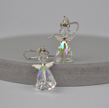 Crystal angel earrings hung from sterling silver wires, made with high grade Austrian crystal