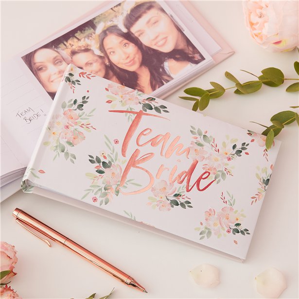 Team Bride photo album open to show photo and comments page