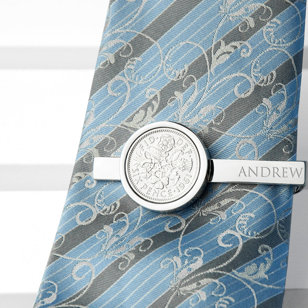 silver plated tie pin with traditonal british sixpence and engraved name, shown on tie