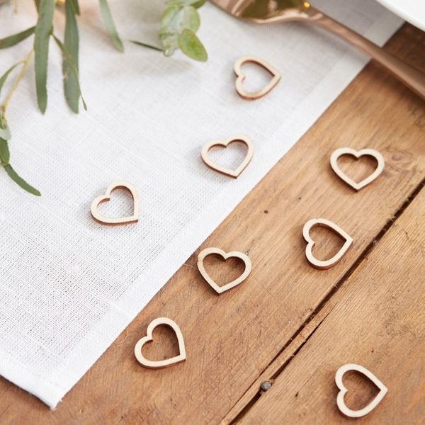 Wooden table confetti, open wooden hearts